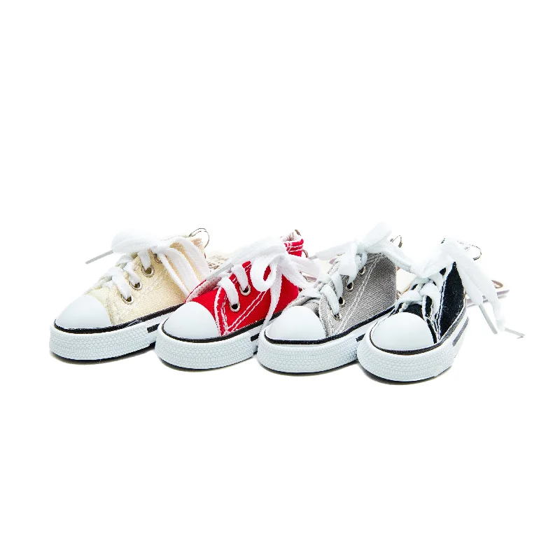 - Rabbit grass rack to prevent waste food boxHigh-Top Sneaker Key Chain