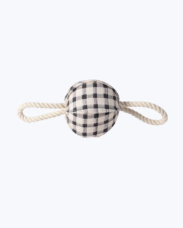 - Natural rubber pet toysPULLING YOU IN PAINTED GINGHAM DOG TOY by Fringe Studio