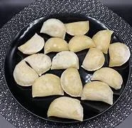- Rabbit grass rack to prevent waste food boxPelmen Perogies Pizza Style